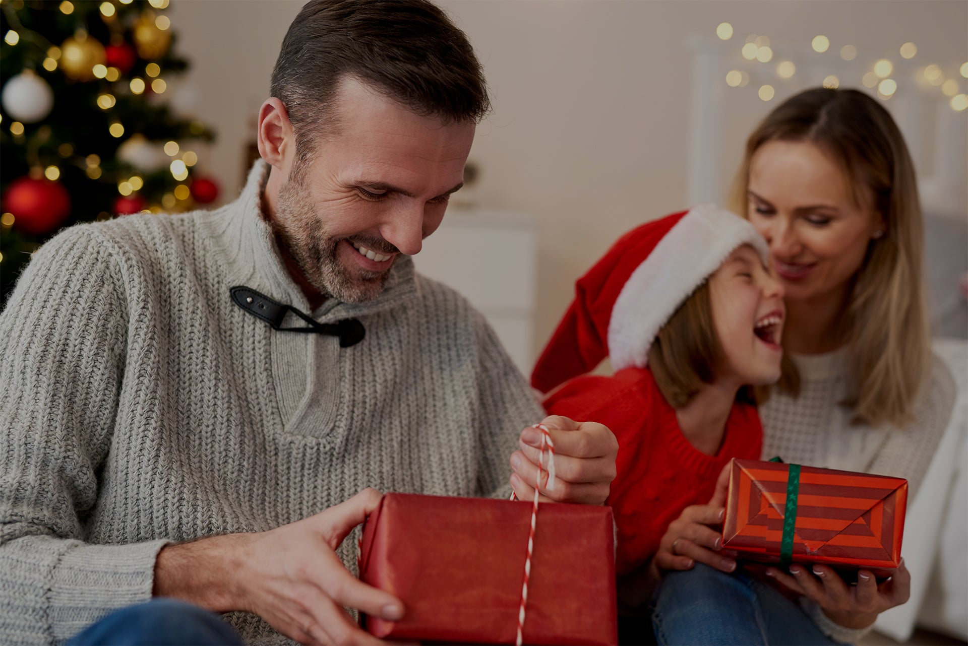 Family opening presents on Christmas